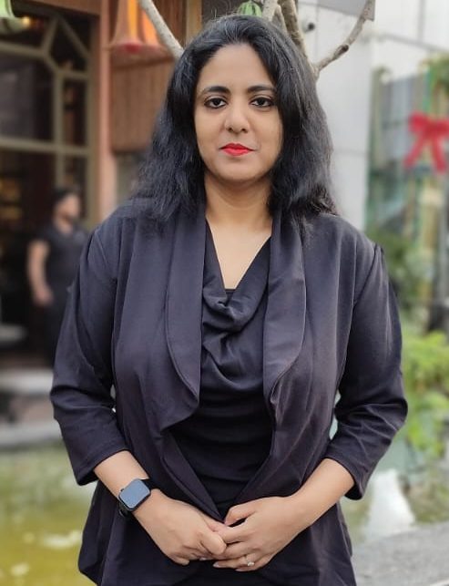 A woman wearing black.